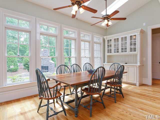 11300 Moonsprite Way Raleigh, NC 27614 - Photo 8 of 25 a view of a dining room with furniture window and wooden floor