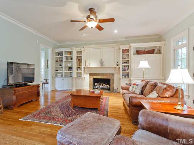 11300 Moonsprite Way Raleigh, NC 27614 - Photo 9 of 25 a living room with furniture and a flat screen tv