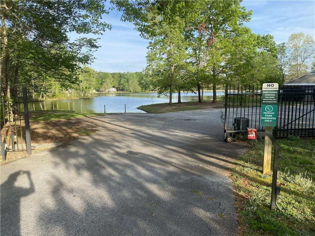 188 Waters Edge Drive Locust Grove, GA 30248 - Photo 23 of 25 a view of a yard with a fountain