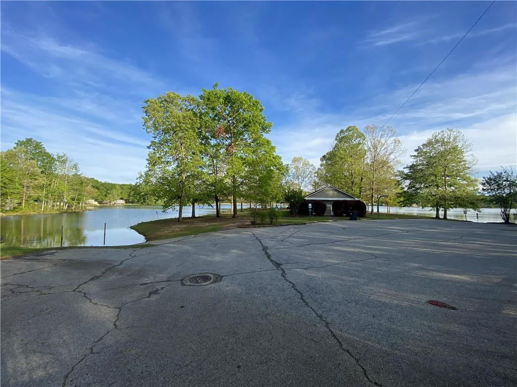 188 Waters Edge Drive Locust Grove, GA 30248 - Photo 24 of 25 a view of a street with a house in the background
