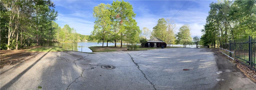 188 Waters Edge Drive Locust Grove, GA 30248 - Photo 25 of 25 a view of a backyard with large trees