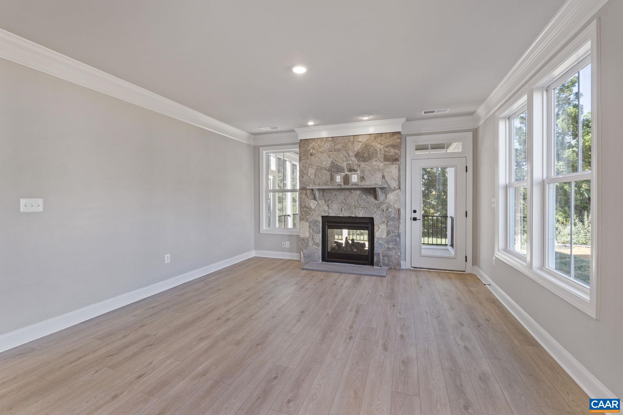 84 Springdale Road Waynesboro, VA 22980 - Photo 17 of 55 a view of an empty room with a fireplace and a window