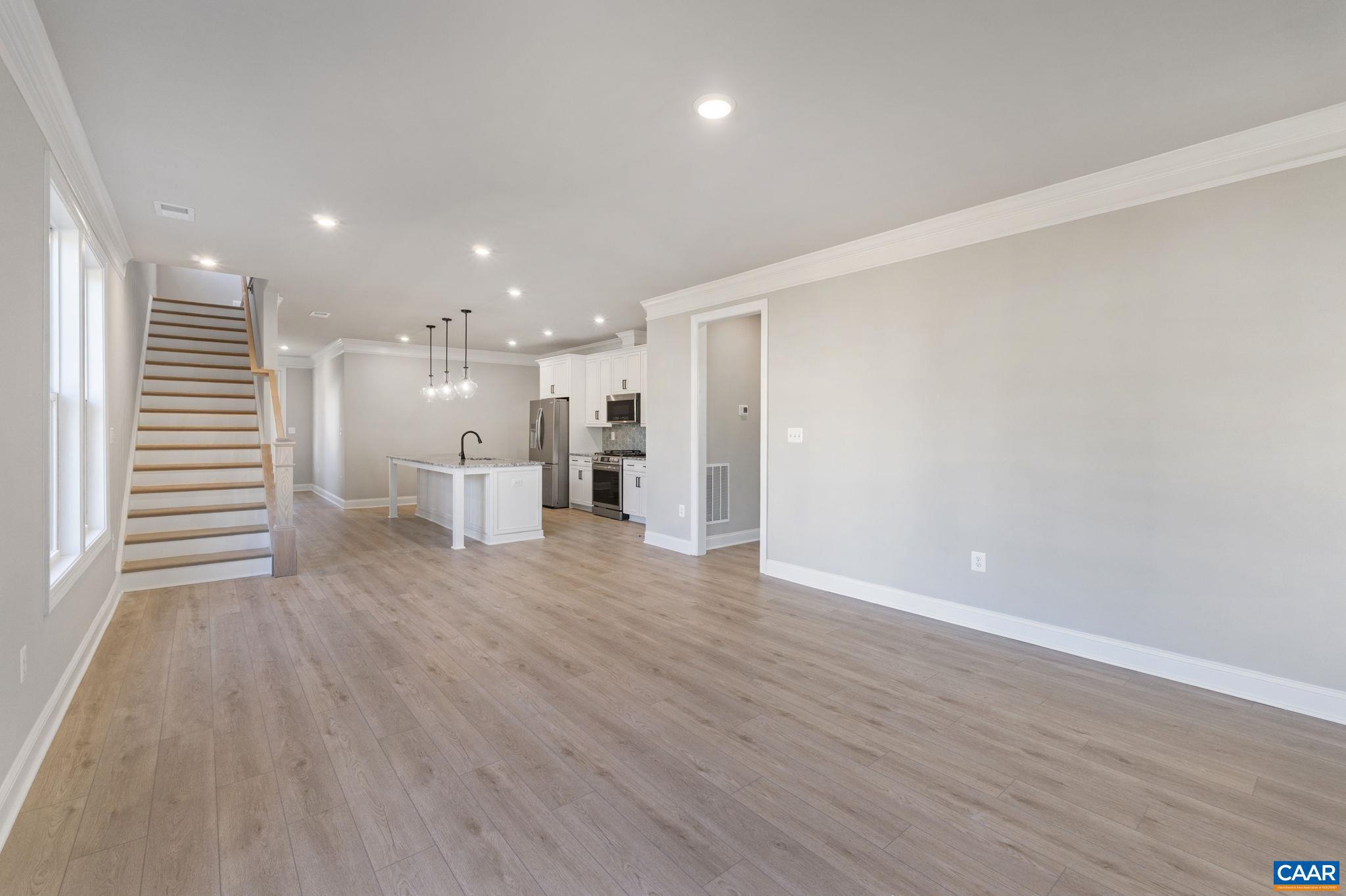 84 Springdale Road Waynesboro, VA 22980 - Photo 19 of 55 a view of a big room with wooden floor and windows