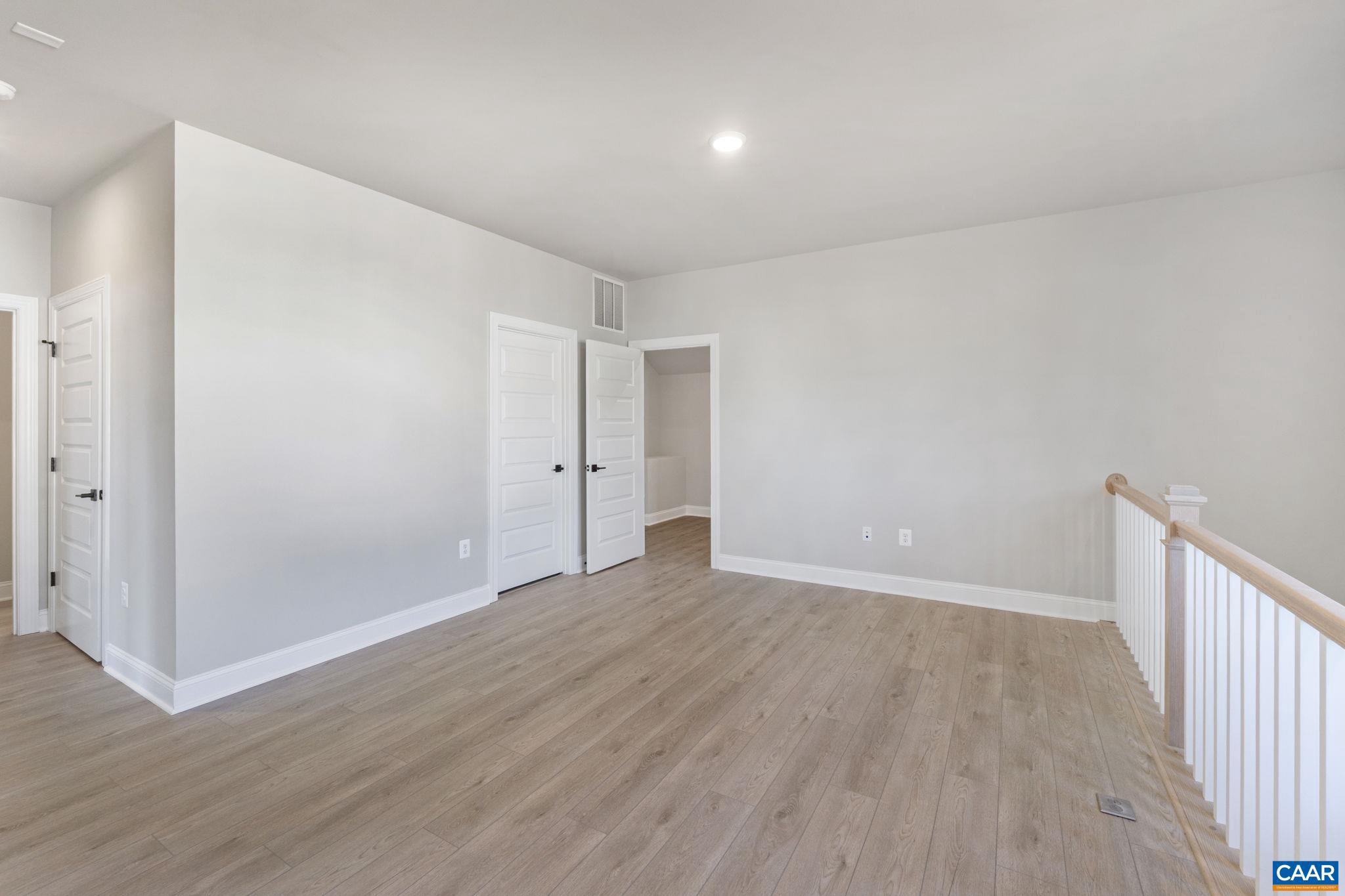 84 Springdale Road Waynesboro, VA 22980 - Photo 27 of 55 a view of an empty room with wooden floor