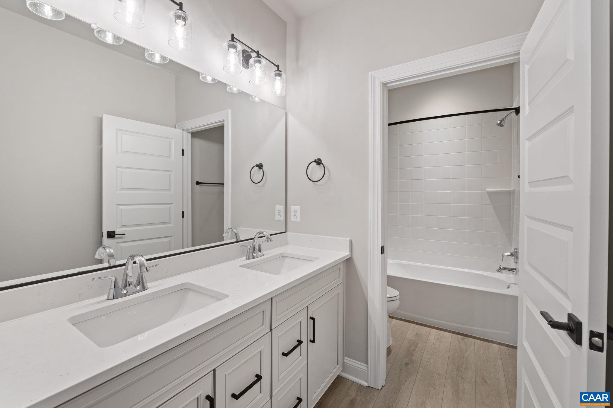 84 Springdale Road Waynesboro, VA 22980 - Photo 39 of 55 a bathroom with a double vanity sink mirror and double