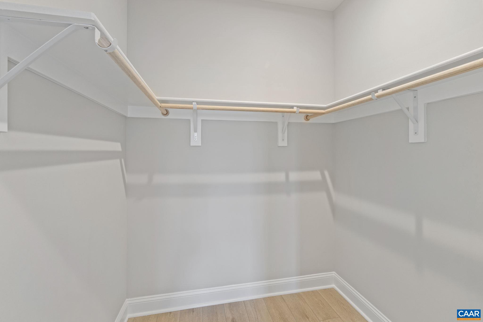 84 Springdale Road Waynesboro, VA 22980 - Photo 40 of 55 a view of walk in closet with empty racks