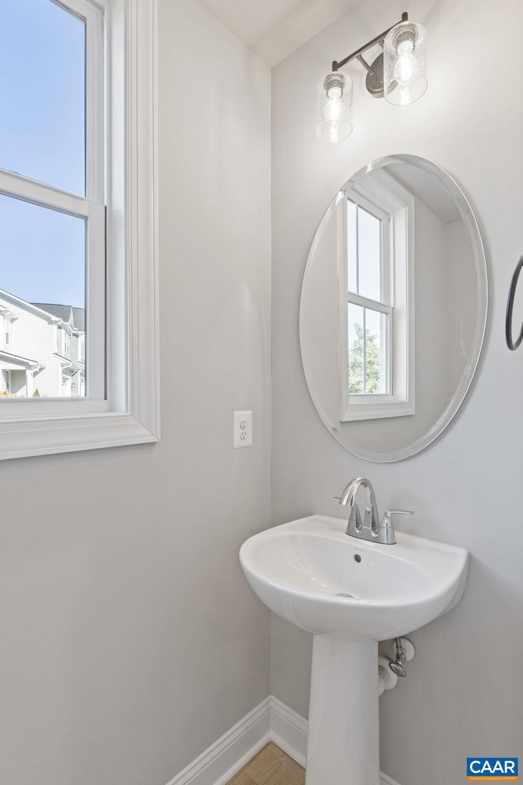 84 Springdale Road Waynesboro, VA 22980 - Photo 7 of 55 a bathroom with a sink a mirror and a window