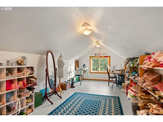 a view of a small house and a yard with green space