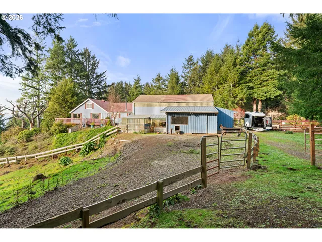 a patio with table and chairs