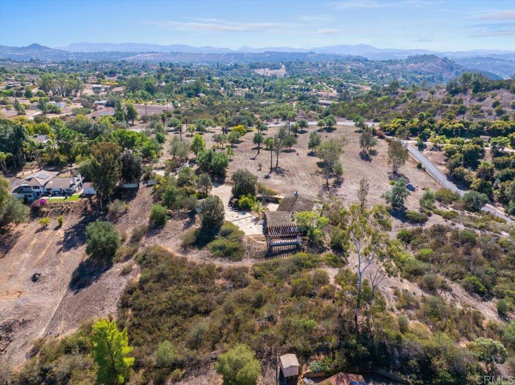 13606 McNally Road Valley Center, CA 92082 - Photo 5 of 9 an aerial view of a city with lots of residential buildings