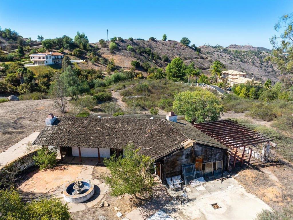 13606 McNally Road Valley Center, CA 92082 - Photo 9 of 9 a view of a house with a yard