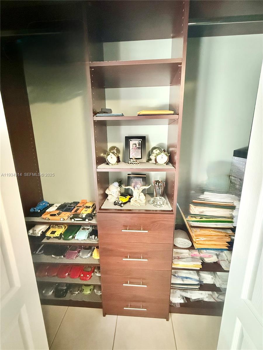 13267 Southwest 277th Terrace Homestead, FL 33032 - Photo 14 of 23 a room with storage and utility