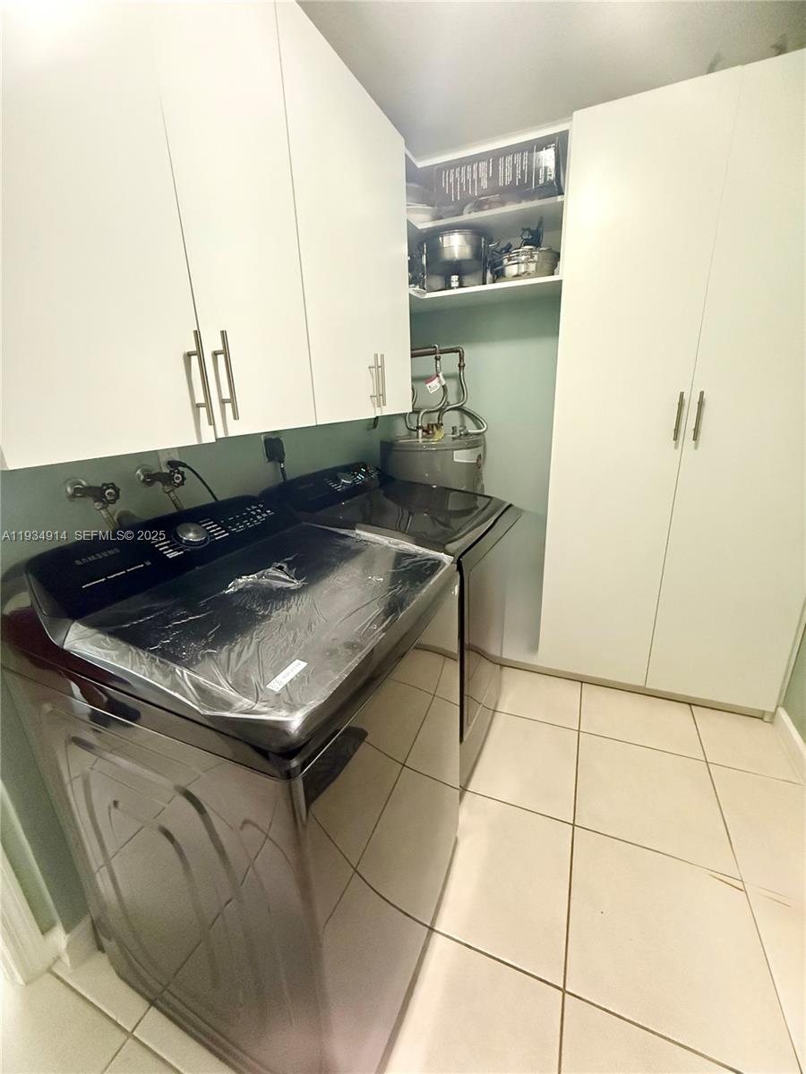 13267 Southwest 277th Terrace Homestead, FL 33032 - Photo 15 of 23 a kitchen with stainless steel appliances granite countertop a sink stove and cabinets