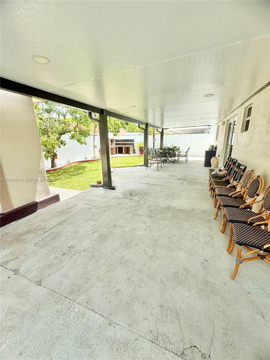 13267 Southwest 277th Terrace Homestead, FL 33032 - Photo 16 of 23 a view of a room with gym equipment