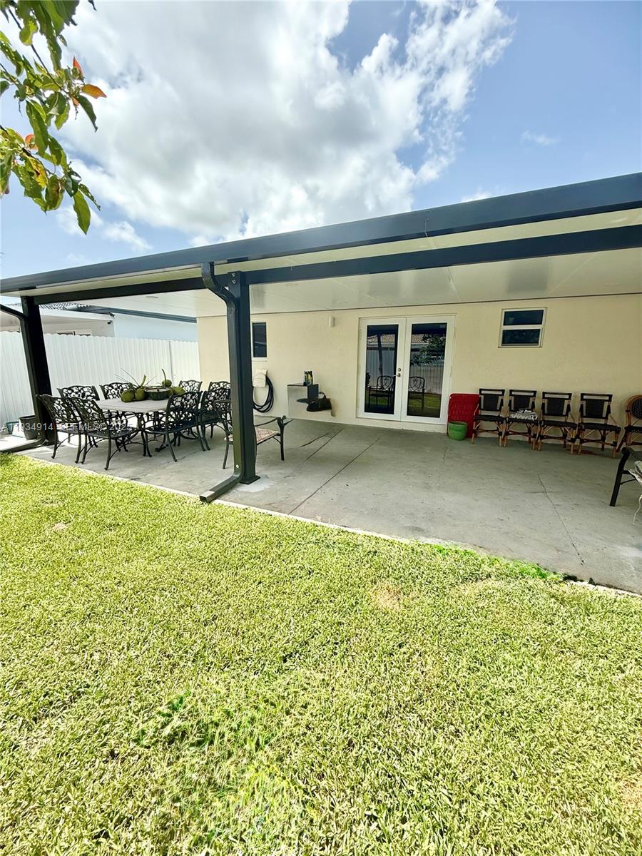 13267 Southwest 277th Terrace Homestead, FL 33032 - Photo 18 of 23 a view of a house with outdoor space