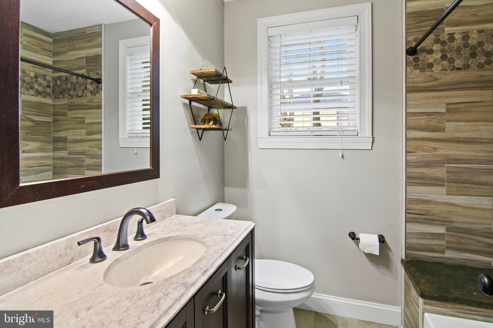 7515 New Cut Road Kingsville, MD 21087 - Photo 22 of 37 Hallway Bathroom- Custom Tile