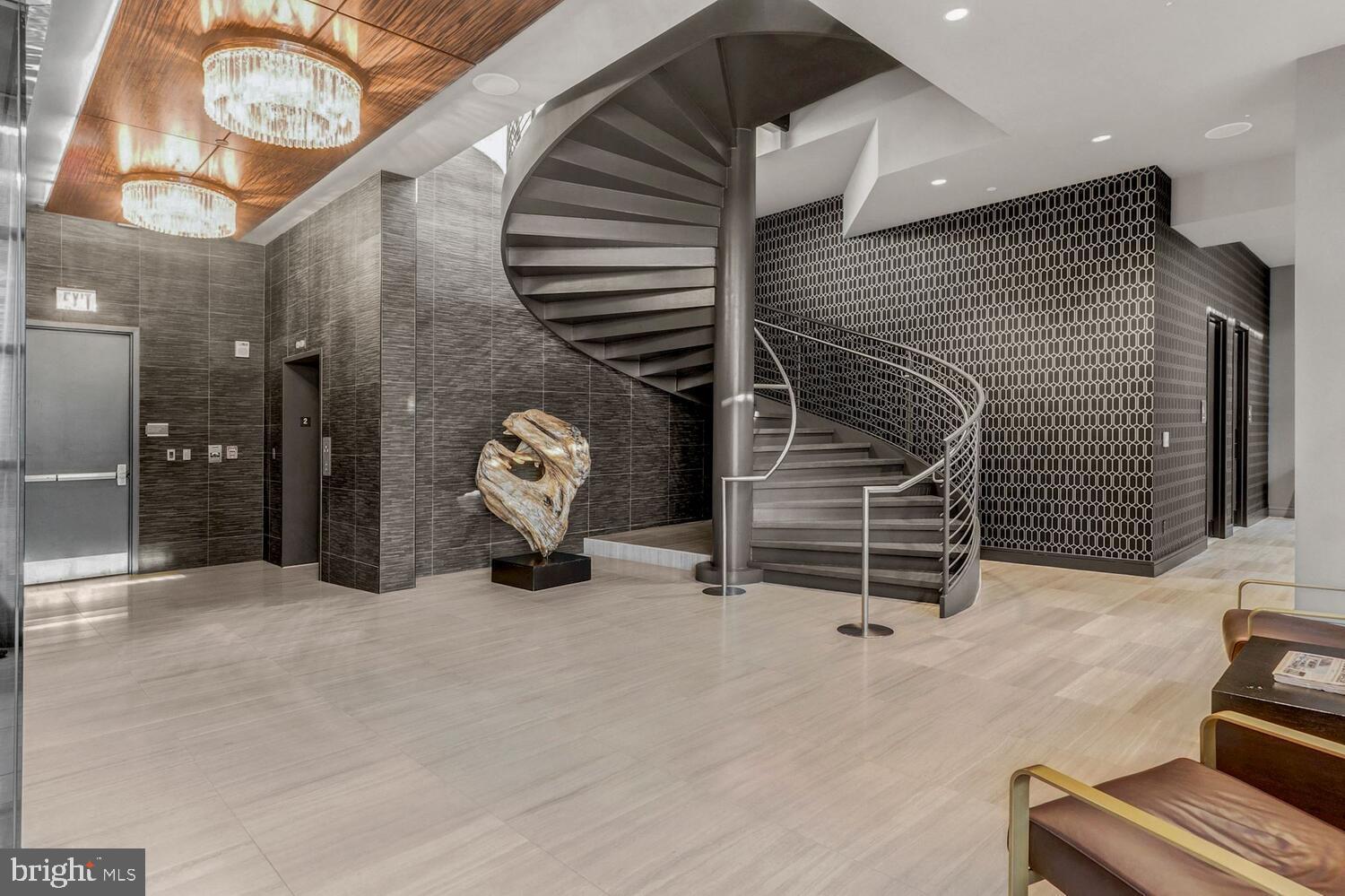 45 Sutton Square Southwest, Unit PH01 Washington, DC 20024 - Photo 66 of 87 Stunning staircase to the Residents Lounge