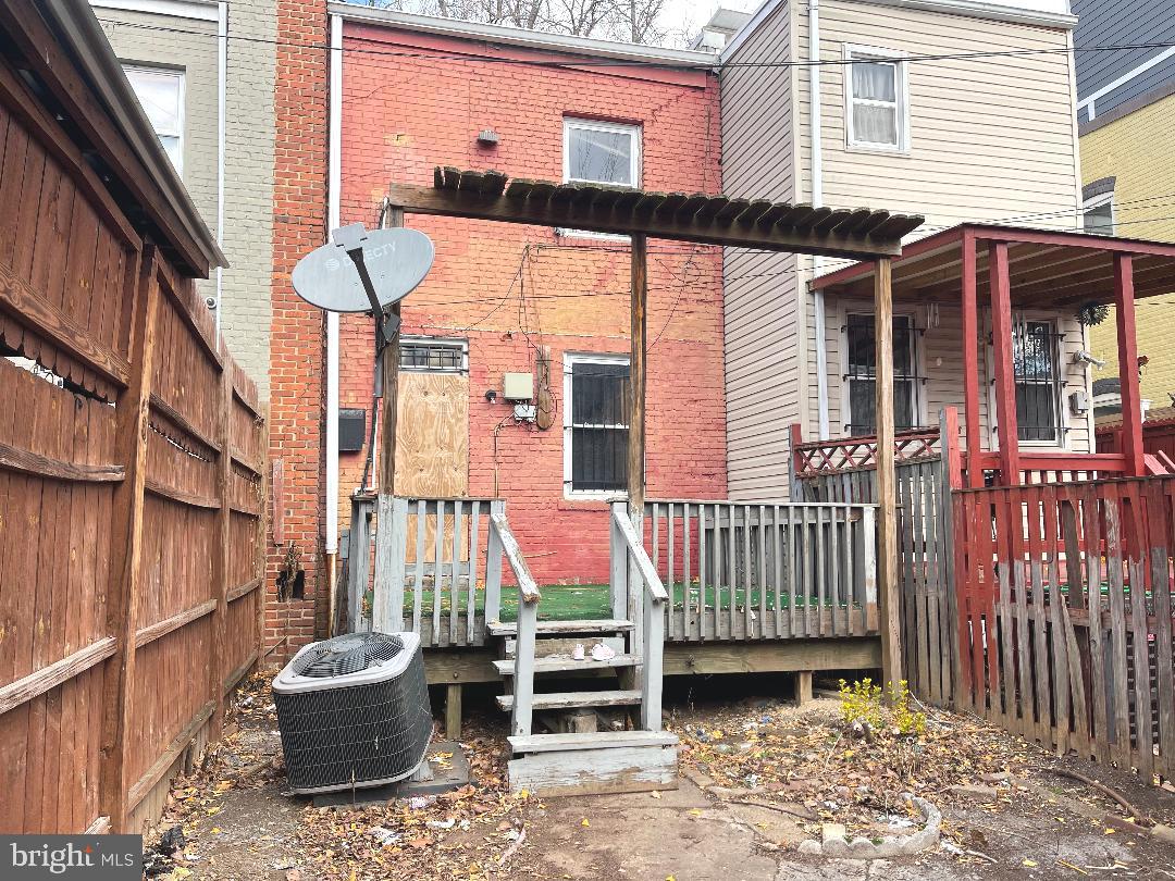 1609 Gales Street Northeast Washington, DC 20002 - Photo 18 of 29 a front view of a house with a garden