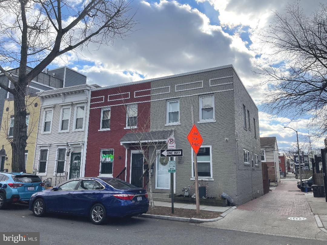 1609 Gales Street Northeast Washington, DC 20002 - Photo 2 of 29 a car parked in front of a building