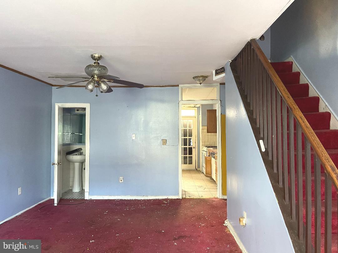 1609 Gales Street Northeast Washington, DC 20002 - Photo 5 of 29 wooden floor and stairs in a hall with an entryway