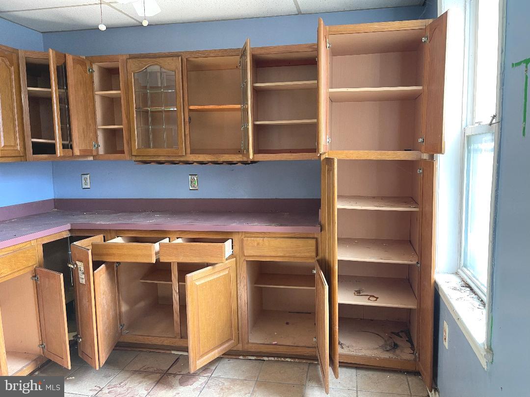 1609 Gales Street Northeast Washington, DC 20002 - Photo 9 of 29 a view of walk in closet with empty racks