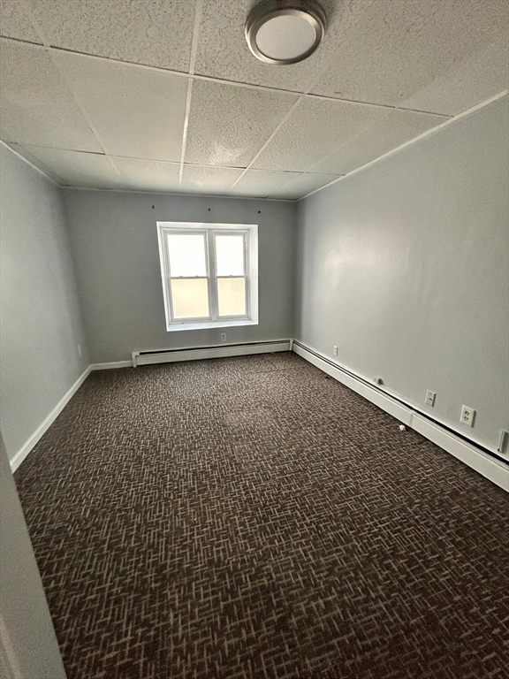 91 Columbia Street, Unit 1 Fall River, MA 02721 - Photo 2 of 5 a view of room and window