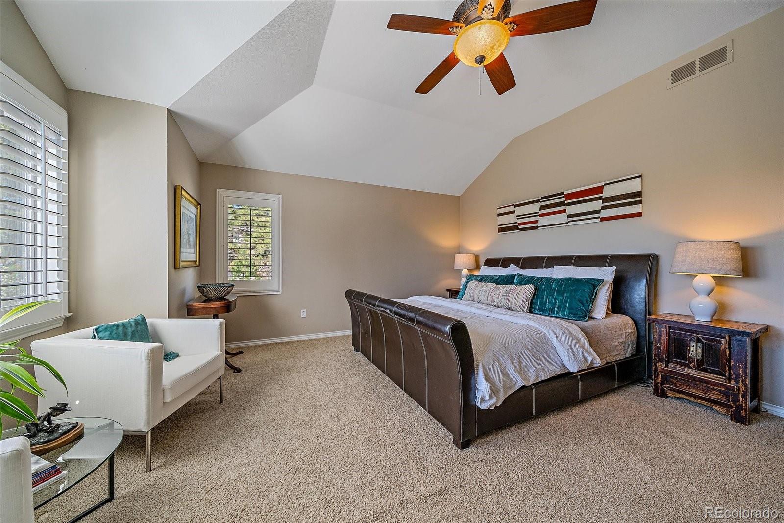 73 North Ranch Road Littleton, CO 80127 - Photo 18 of 49 a bedroom with a bed dresser and a window