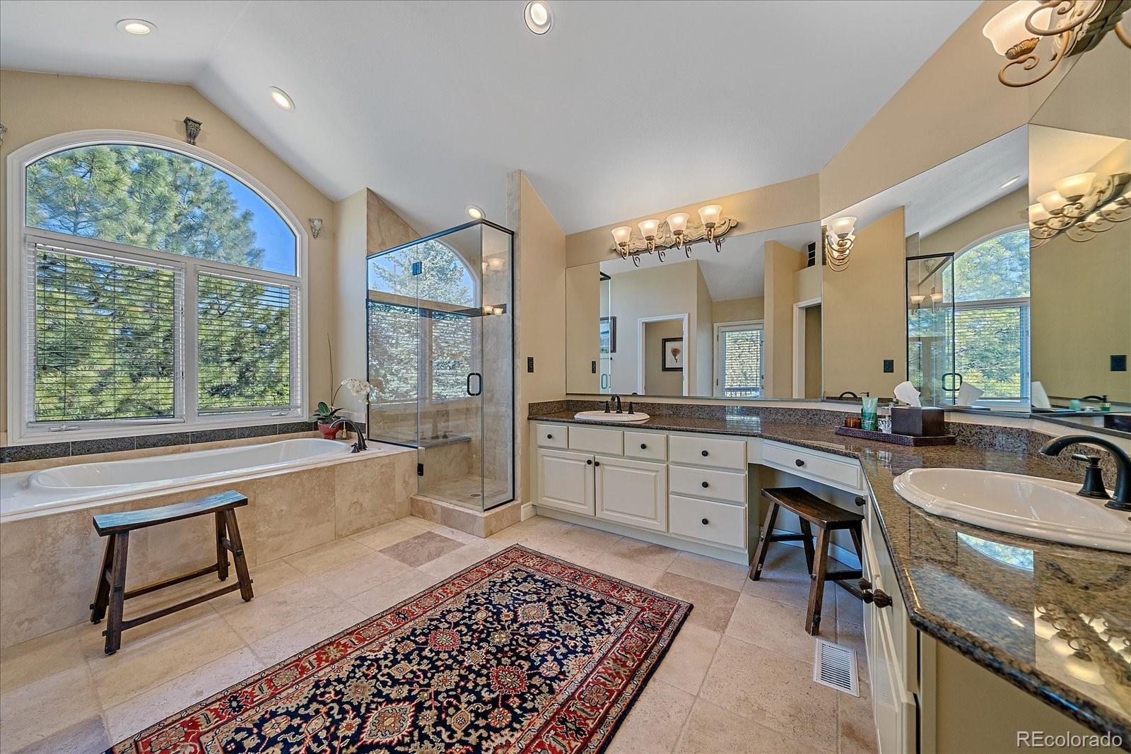 73 North Ranch Road Littleton, CO 80127 - Photo 19 of 49 a large bathroom with a large tub and sink
