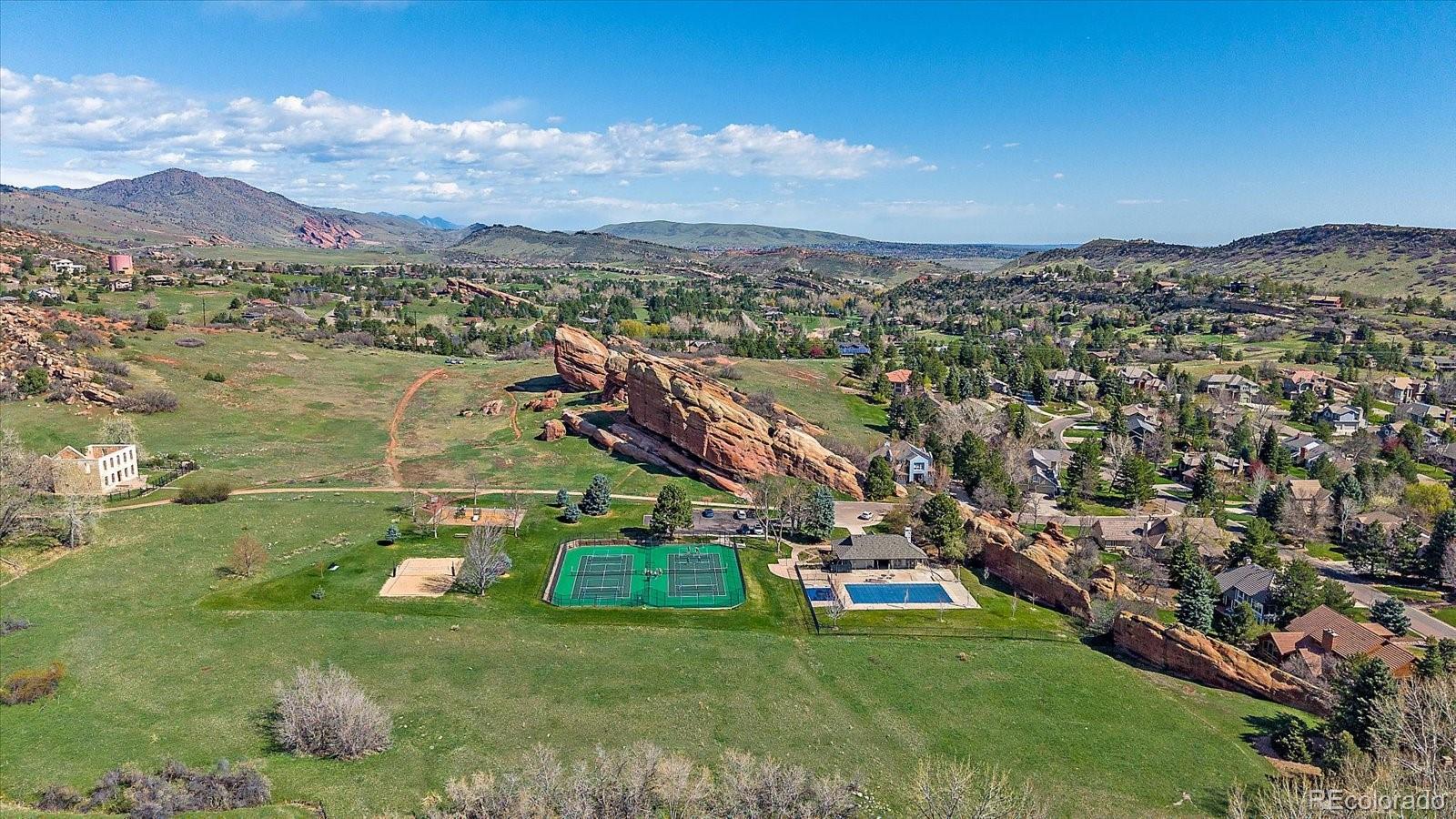 73 North Ranch Road Littleton, CO 80127 - Photo 43 of 49 an aerial view of residential houses with outdoor space and trees