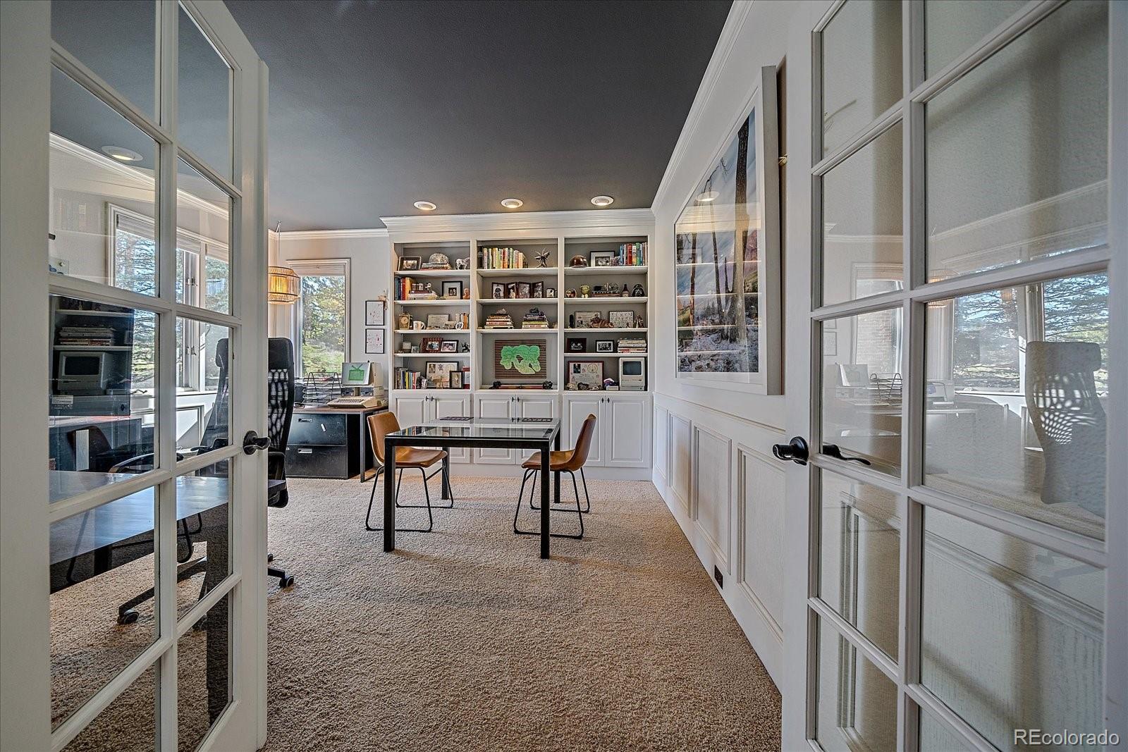 73 North Ranch Road Littleton, CO 80127 - Photo 6 of 49 a view of a livingroom with furniture and floor to ceiling window
