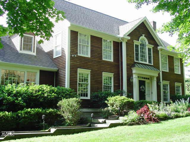 28 Ned's Mountain Road Ridgefield, CT 06877 - Photo 1 of 1 front view of a house with a yard