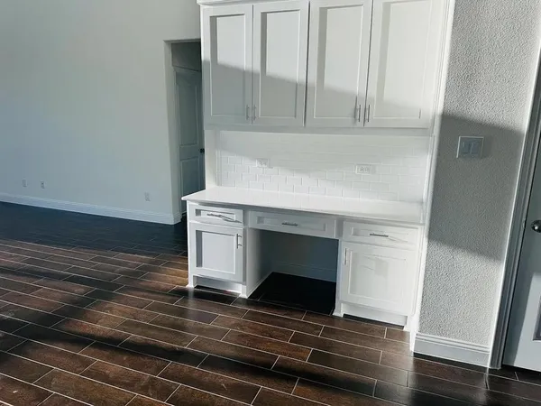 a bathroom with a sink double vanity and a mirror