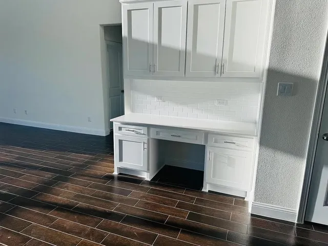 a bathroom with a sink double vanity and a mirror