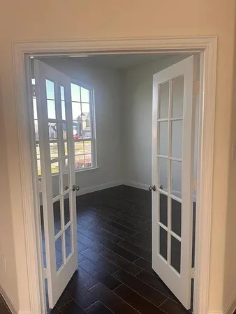 a bathroom with a close shower view