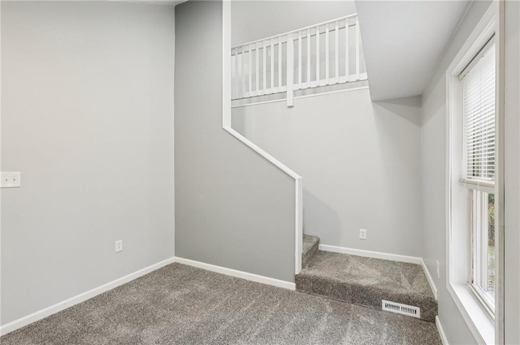 305 Queenstown Road Karns City, PA 16041 - Photo 25 of 38 an empty room with windows