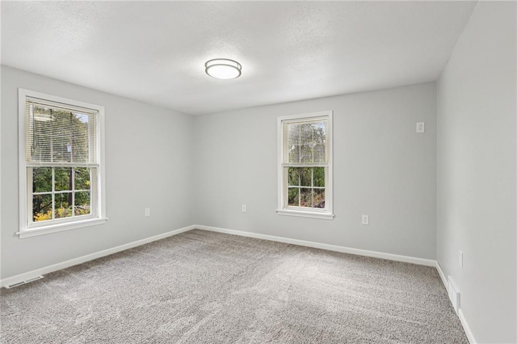 305 Queenstown Road Karns City, PA 16041 - Photo 29 of 38 an empty room with a window