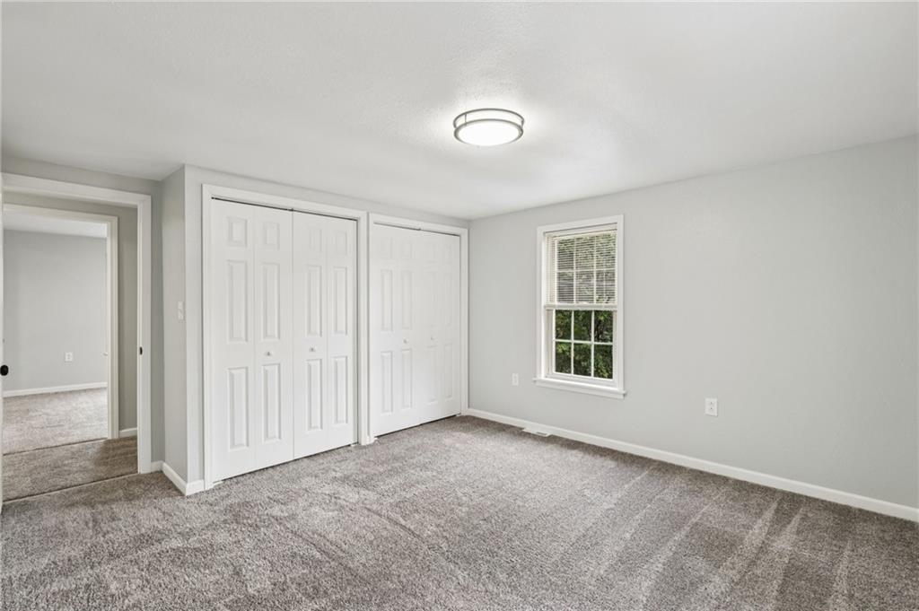 305 Queenstown Road Karns City, PA 16041 - Photo 30 of 38 an empty room with windows