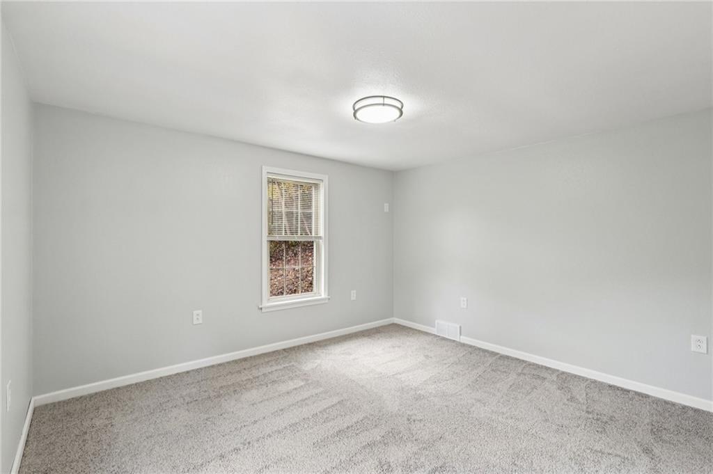 305 Queenstown Road Karns City, PA 16041 - Photo 31 of 38 an empty room with a window