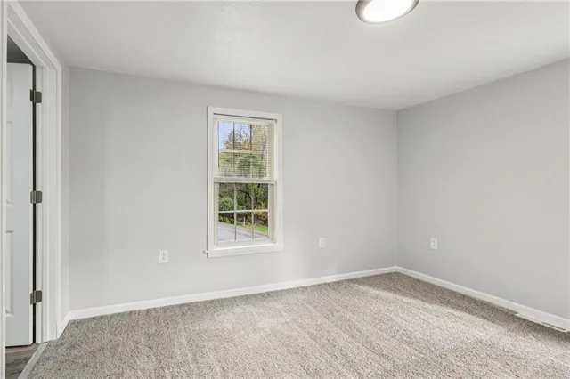 an empty room with a window