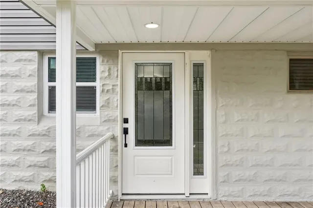 a view of a brick house with a door