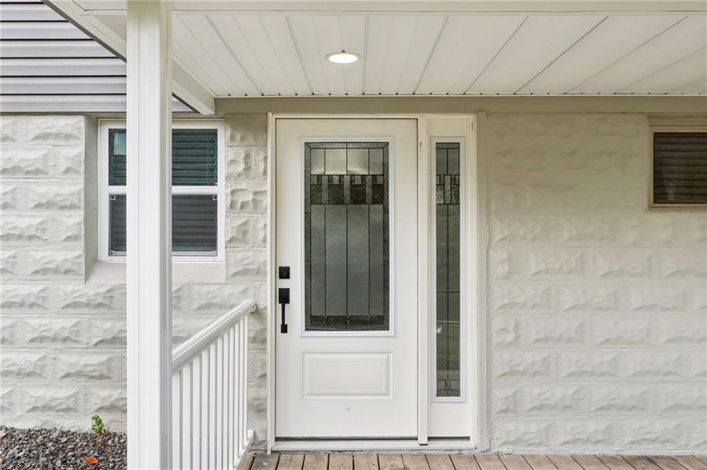305 Queenstown Road Karns City, PA 16041 - Photo 7 of 38 a view of a brick house with a door