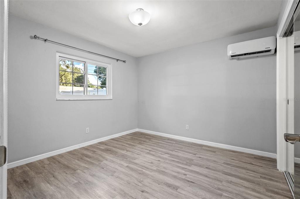 2033 Little Neck Road Clearwater, FL 33755 - Photo 26 of 39 Bedroom 2 with separate temperature control