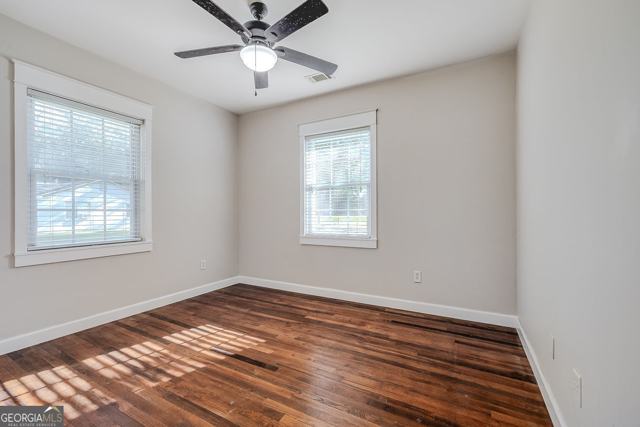125 Parsons Avenue Pooler, GA 31322 - Photo 16 of 28 a view of a room with wooden floor and windows