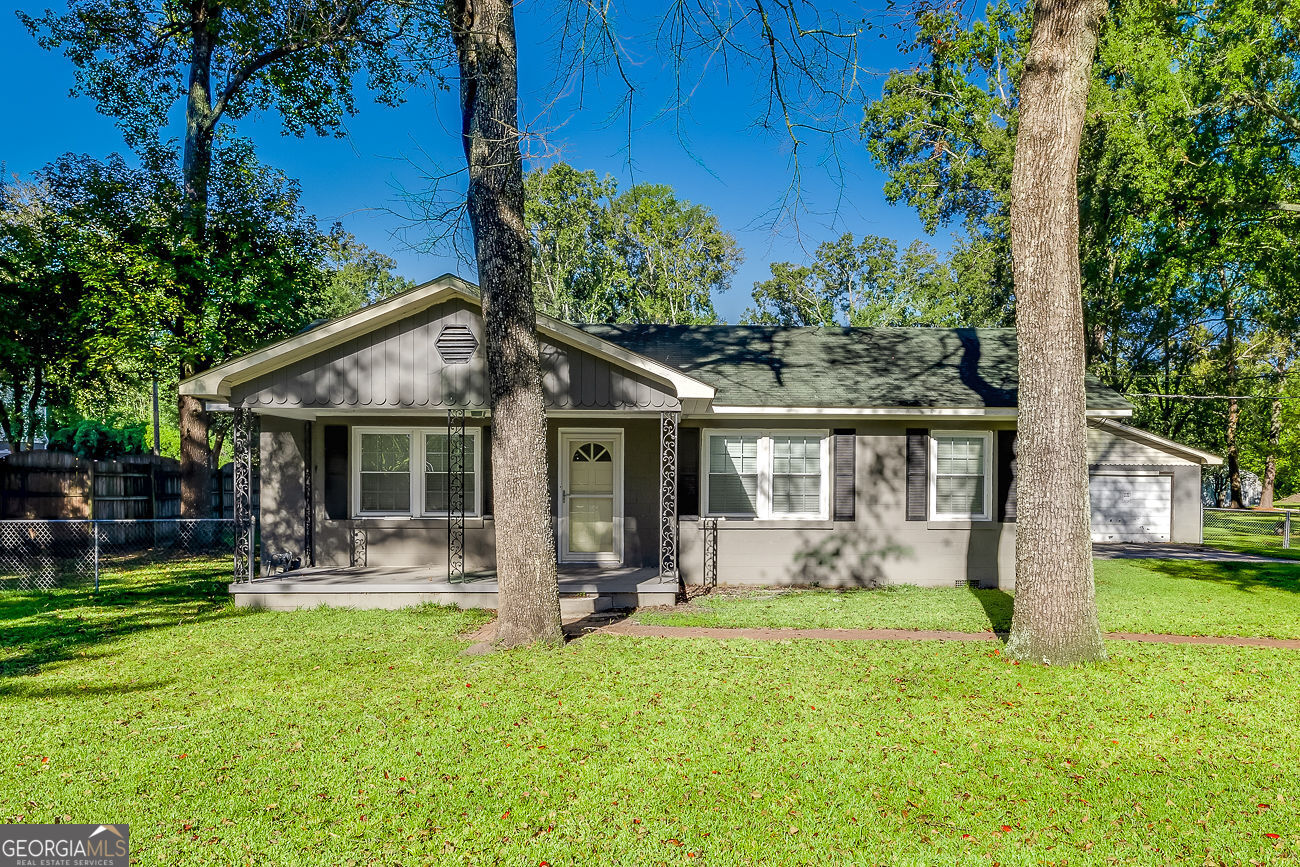 125 Parsons Avenue Pooler, GA 31322 - Photo 2 of 28 a front view of a house with patio