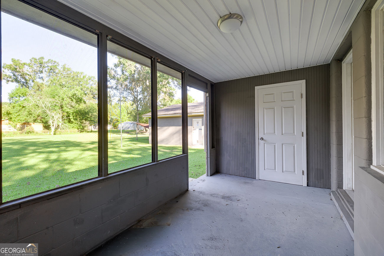 125 Parsons Avenue Pooler, GA 31322 - Photo 23 of 28 a view of an empty room with a large window