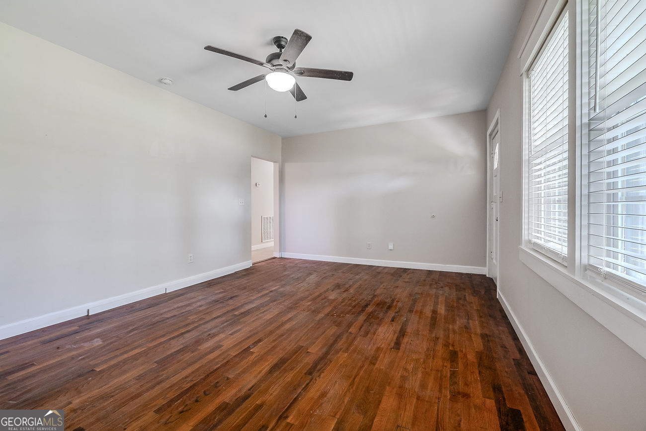 125 Parsons Avenue Pooler, GA 31322 - Photo 6 of 28 wooden floor in an empty room with a window