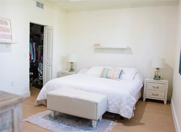 a room with furniture and flat screen tv