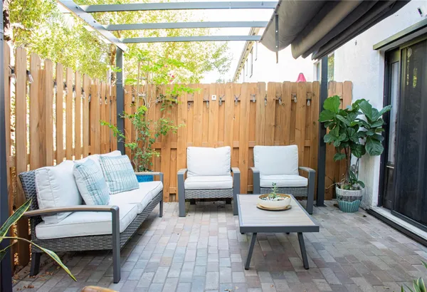 a view of a balcony with chairs