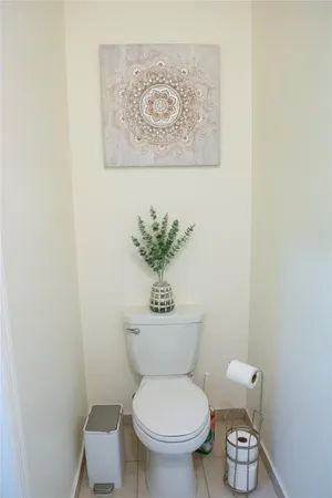 a room with a sink a mirror and vanity