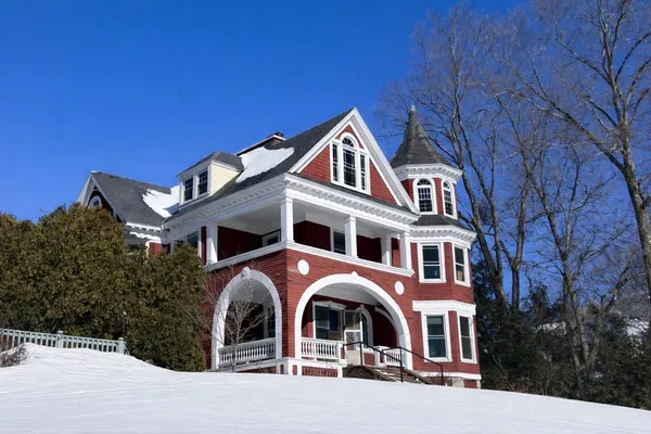 a front view of a house with yard